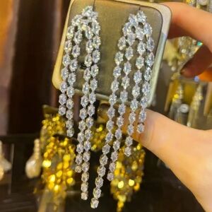 Exaggerated bohemian zirconia fringe earrings.